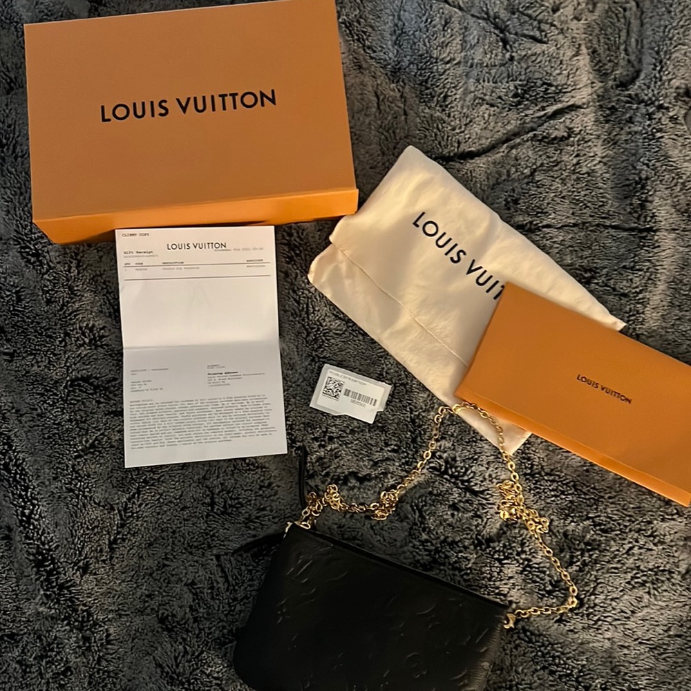 Louis Vuitton double zip pochette in black empreinte